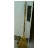 Decorative broom approximately 51" long.