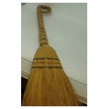 Decorative broom approximately 37" long.