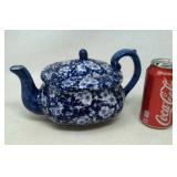 Blue and white teapot.