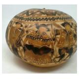 Hand carved gourd. Signed by L. Sequil D.