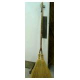 Decorative broom with 2 brooms.