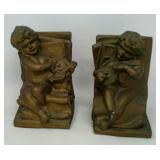 2 Ceramic cherubs bookends.