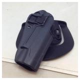 Belt holster for Colt 1911 by Blackhawk.