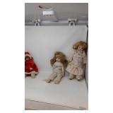 3 porcelain dolls, unmarked.