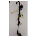 Golfers walking stick complete with golf ball