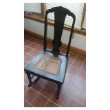 Rattan bottom antique wood rocker.