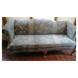 Vintage upholstered couch with wooden legs, 75" w