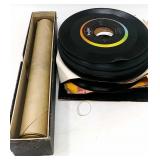 Vintage piano roll and size 45 RPM records