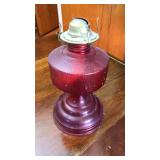 Red glass oil lamp, no chimney