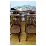 4 matching wooden dining chairs.