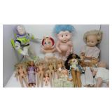 Vintage dolls including buzz lightyear, barbies,