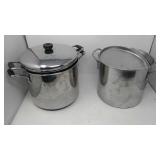 2 cooking pots one has steaming pot