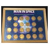 Man In Space commemorative coins in metal frame