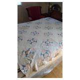 Very worn handmade quilt. You may salvage a