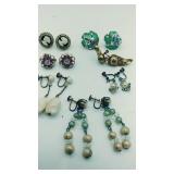 7 pairs of clip on earrings