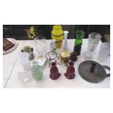 Assorted candle holders and vases