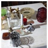 Assorted candles and holders.