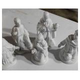 Assorted ceramic figurines, some religious, soap