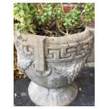 Concrete flower pot is approximately 17 inches