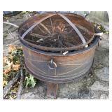 Metal fire pit is 26 inches round