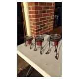 3 piece candle holders and new candles.