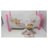 2 Dolls and a doll bed