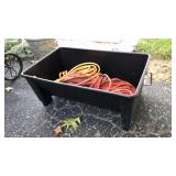 Huge painters bucket full of extension cords