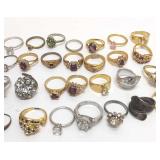 28 Costume jewelry rings.