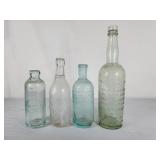 Vintage medicine and other bottles.