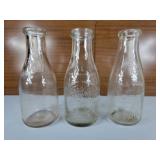Three Vintage Quart bottles