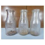 Three Vintage One Pint milk bottles