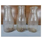 Three Vintage One Pint milk bottles