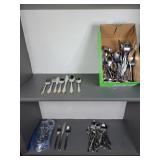 2 sets Flatware & lots of extra Spoons