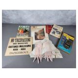 Shear pink gloves, linens, books.