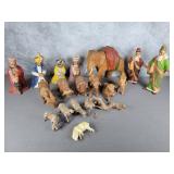 Hand carved wisemen, sheep, goats elephant
