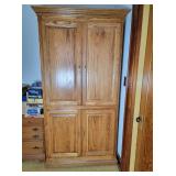 Solid Oak entertainment cabinet on wheels