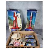 Two Honest John rockets and fuel packs