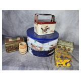 Three tins and a cardboard box