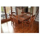 Dining table with 6 chairs & 2 leaves. 50"x50".