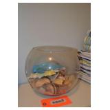 Glass bowl of seashells