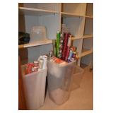 Contents of closet including wrapping paper, gift