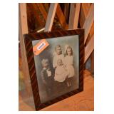 Picture with frame. Frame is damaged. 20"x24"