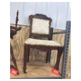 Eastlake style chair with porcelain casters