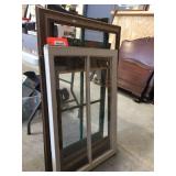 Assorted sized wood framed windows