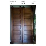 Pair of 6 panel doors with rollers on top 30x96