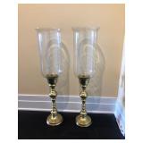 Pair of glass candle holders with large glass