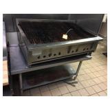Charbroil grill with seven burners on stainless