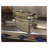Five stainless steel pans 6 x 12