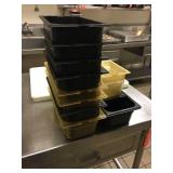 Two stacks of plastic containers