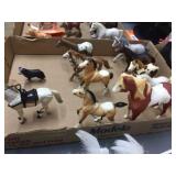 Assorted horse toys / one dog